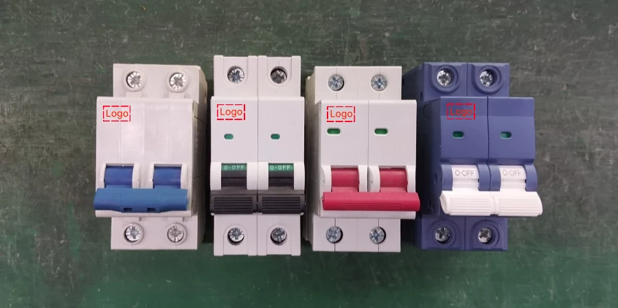 Four double-pole circuit breakers lined up on a green surface; the first three are white with blue, black, and red handles respectively, and the fourth is blue with a white handle. Each has a red Logo placeholder box.