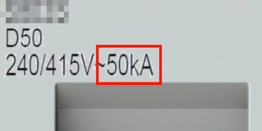 A close-up of an MCB nameplate showing D50, 240/415V, and 50kA, with a red rectangle around 50kA.
